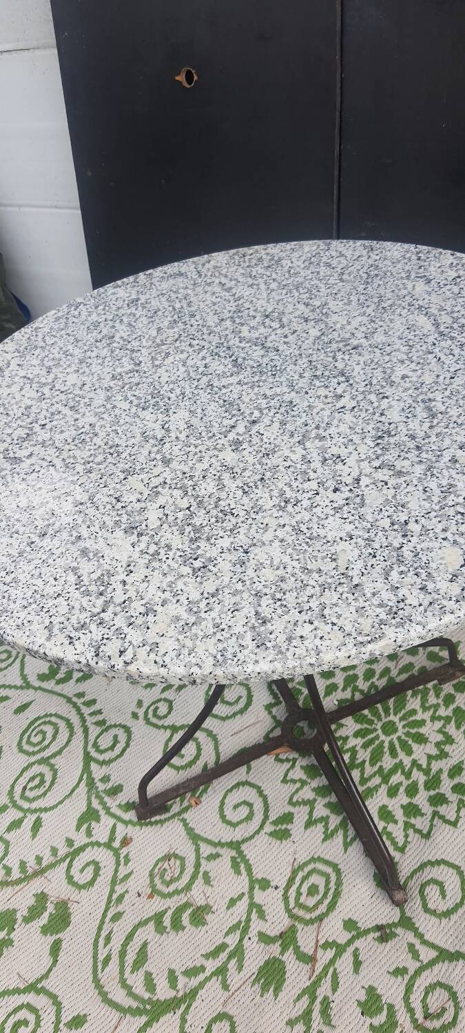 Wrought iron pedestal table