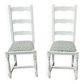 Paire de chaises anciennes en bois peint blanc à haut dossier