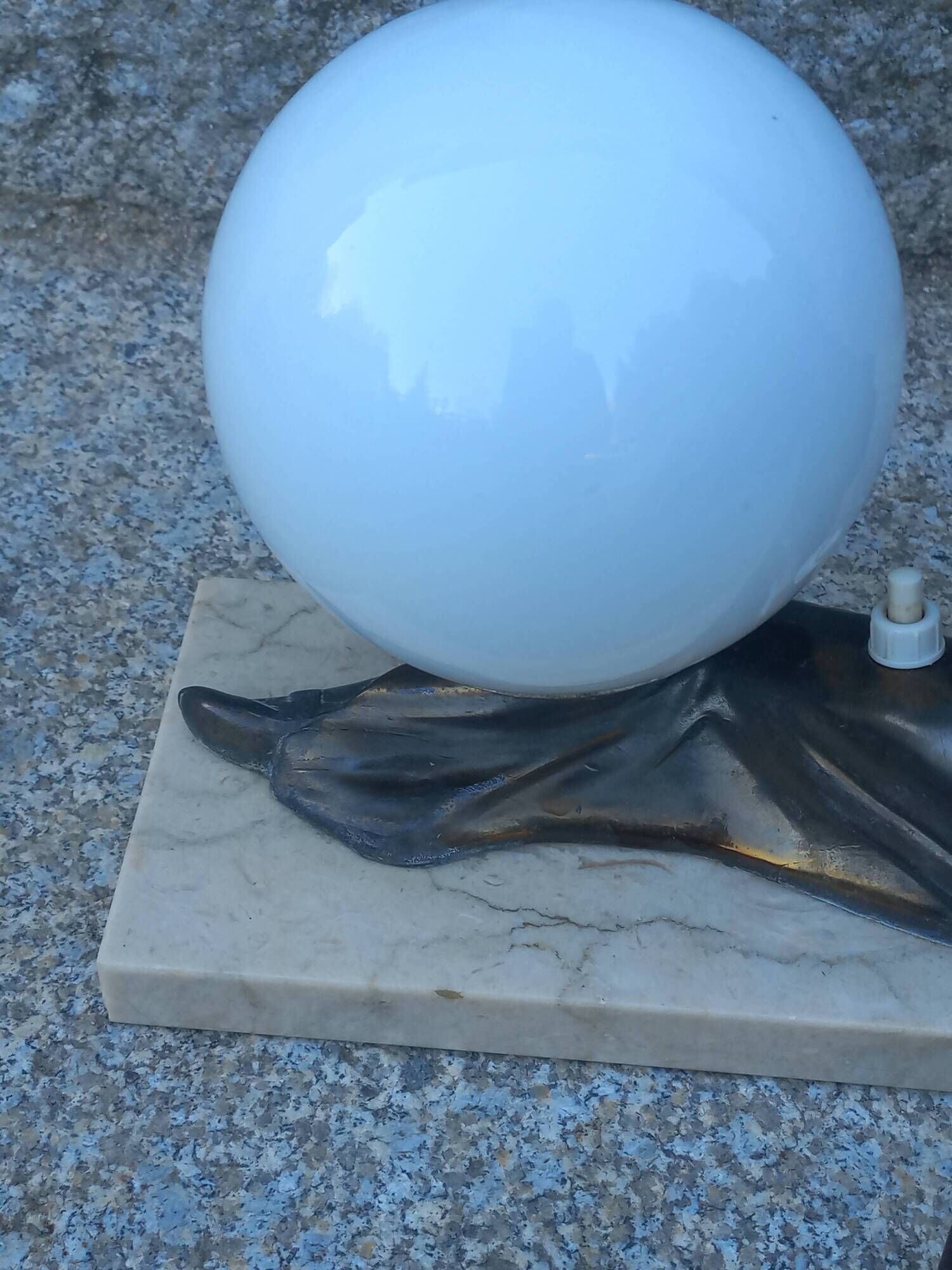 Art Deco lamp in cast iron and marble with a white opaline globe.