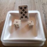Very old small dice and playing card