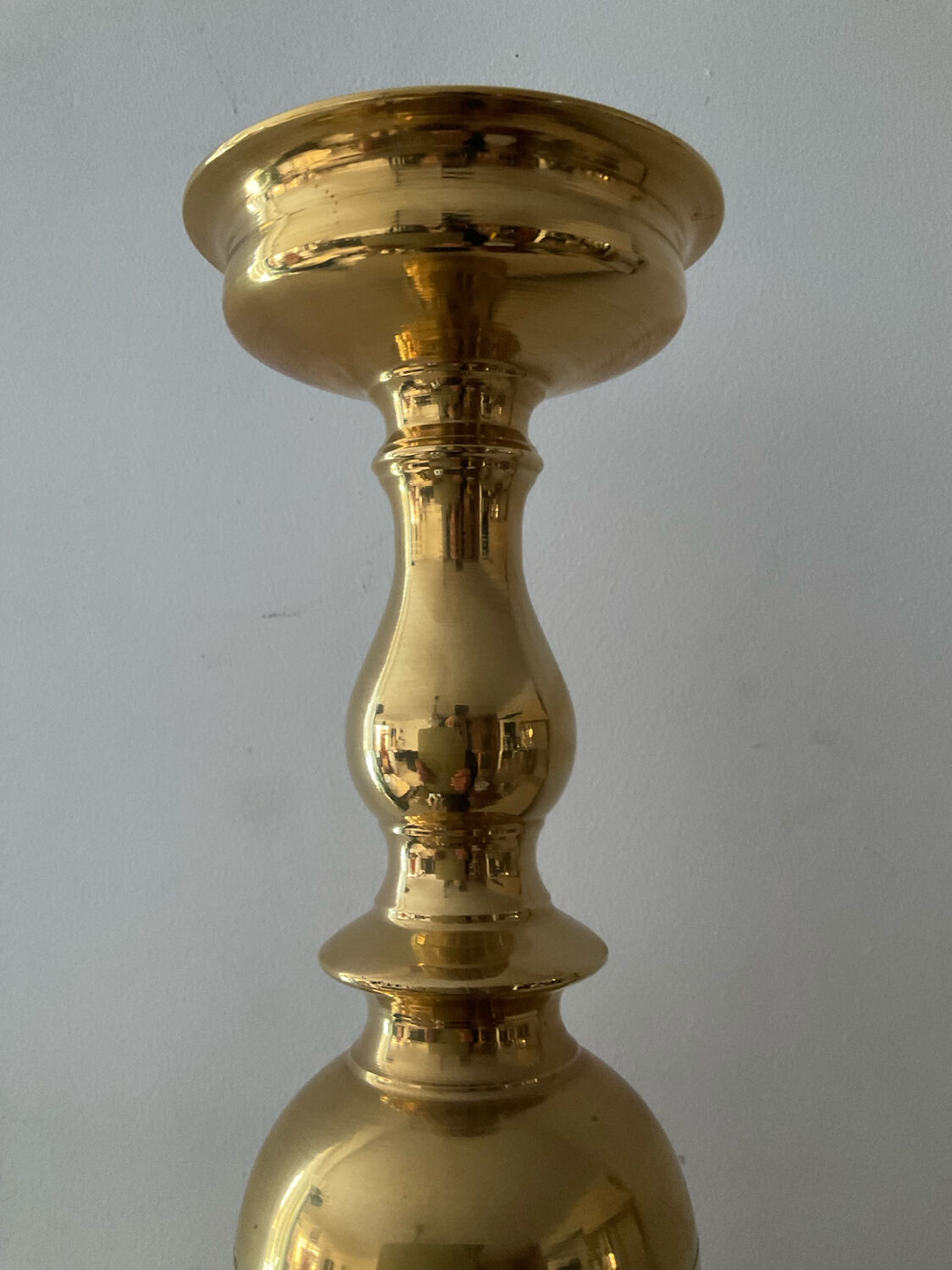 Antique candle holder in solid bronze