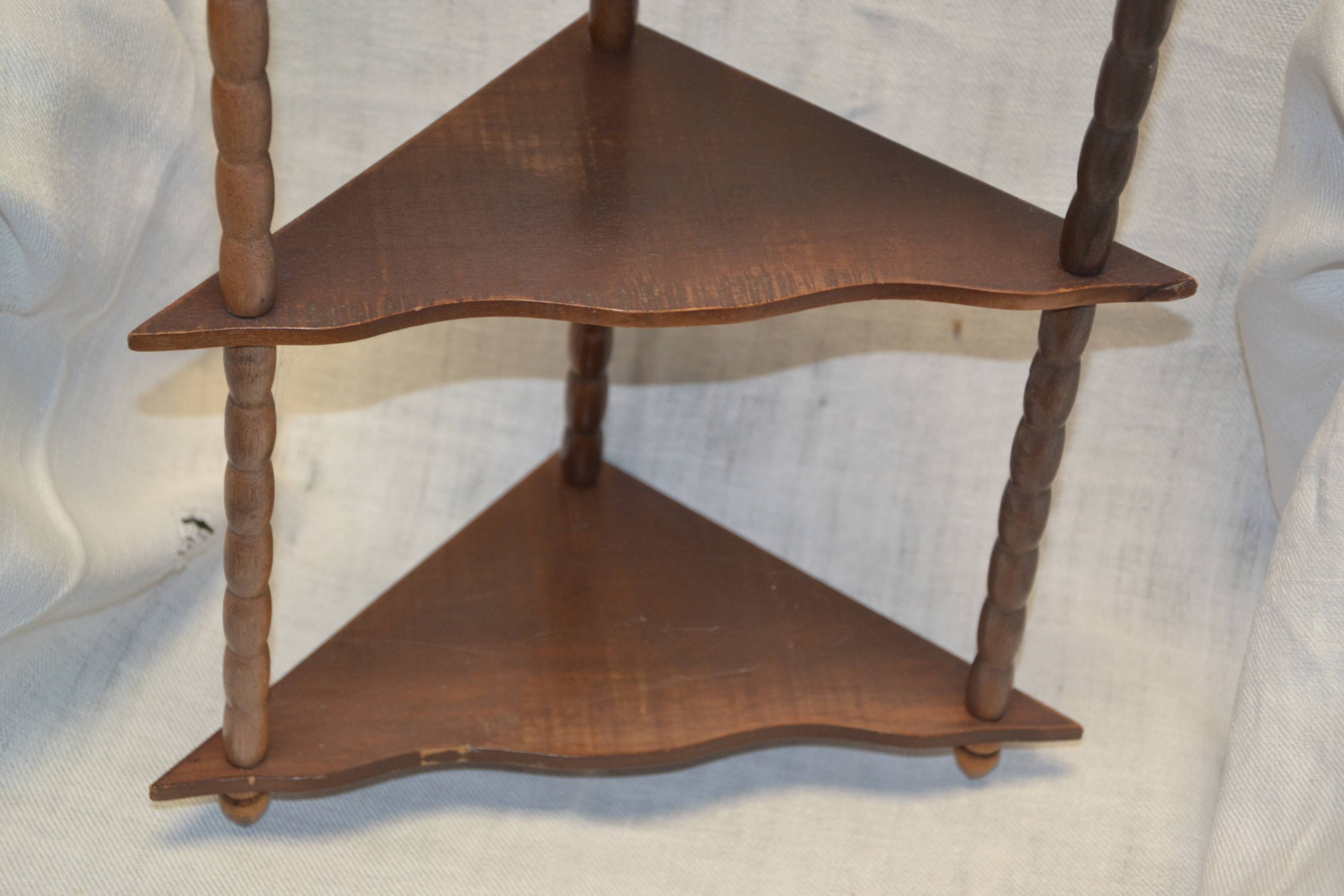 small wooden corner shelf