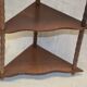 small wooden corner shelf