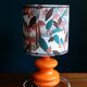 Mushroom lampshade and vintage orange glass lamp foot