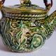 Set of old teapots and honey pot
