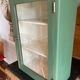 Small wooden cabinet patinated arsenic green