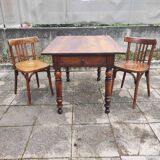 Antique farmhouse table and bistro chairs