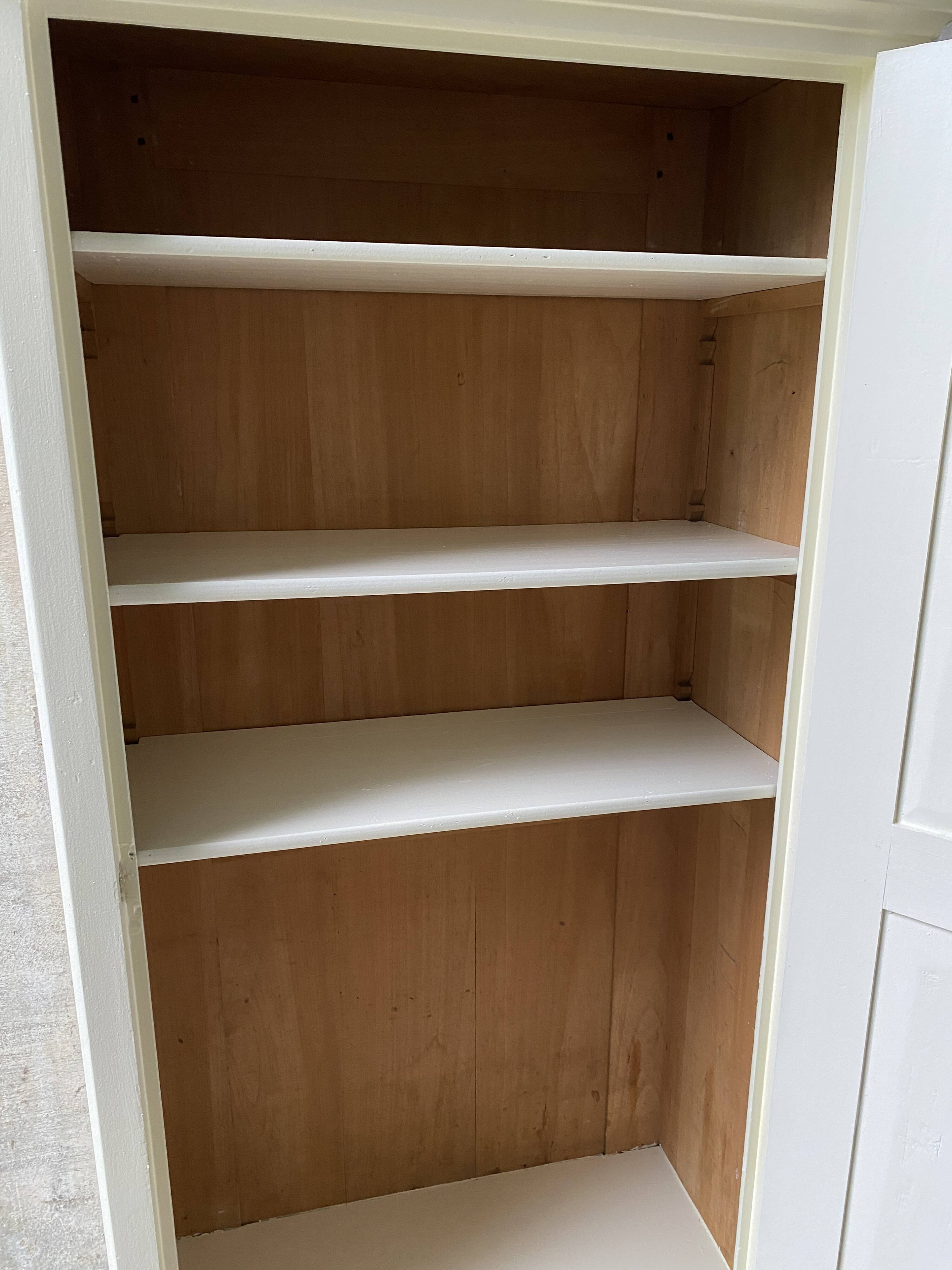 Vintage Parisian wardrobe, pale yellow lacquer, one door, three shelves, one drawer