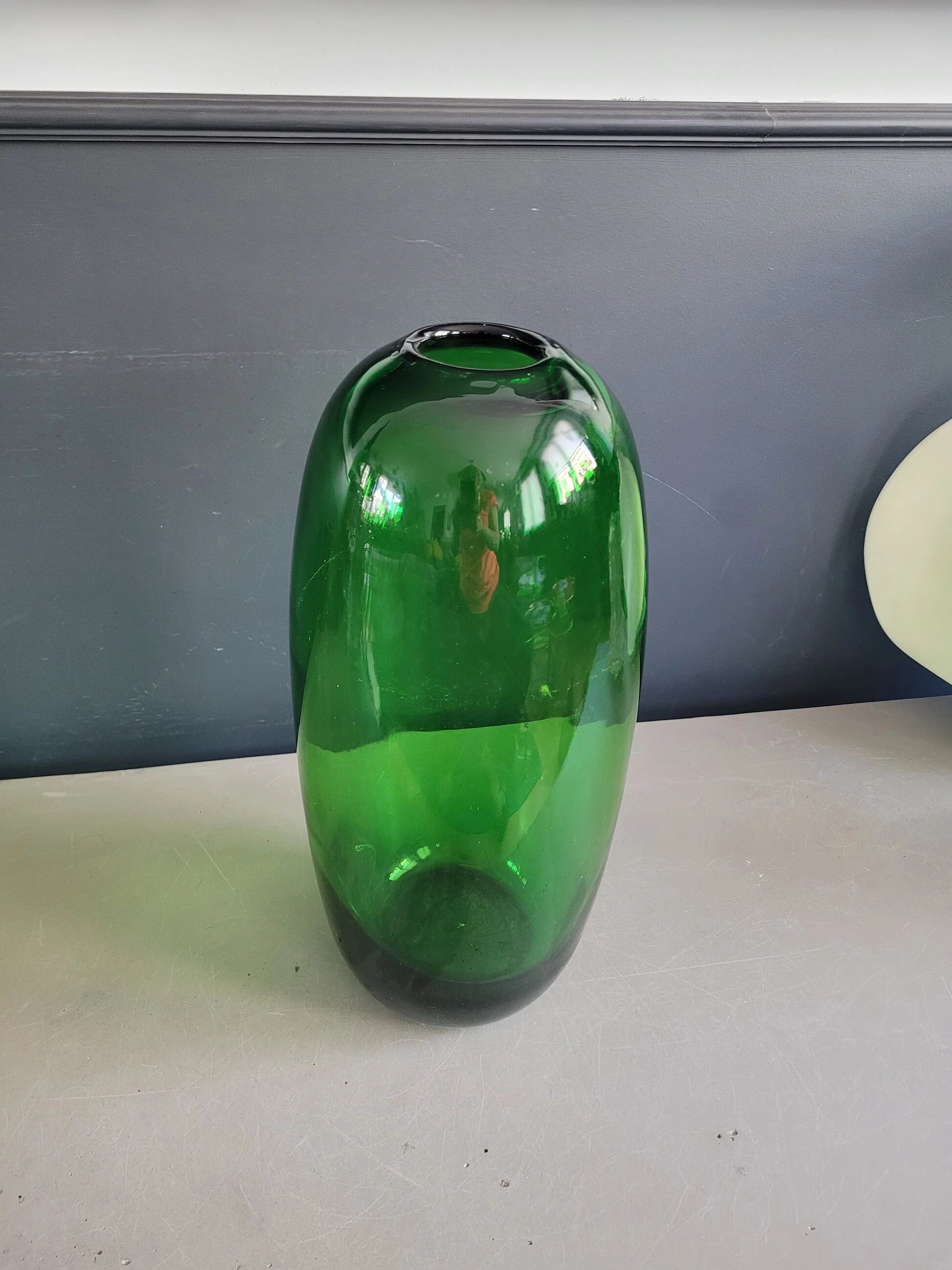 Large green glass vase