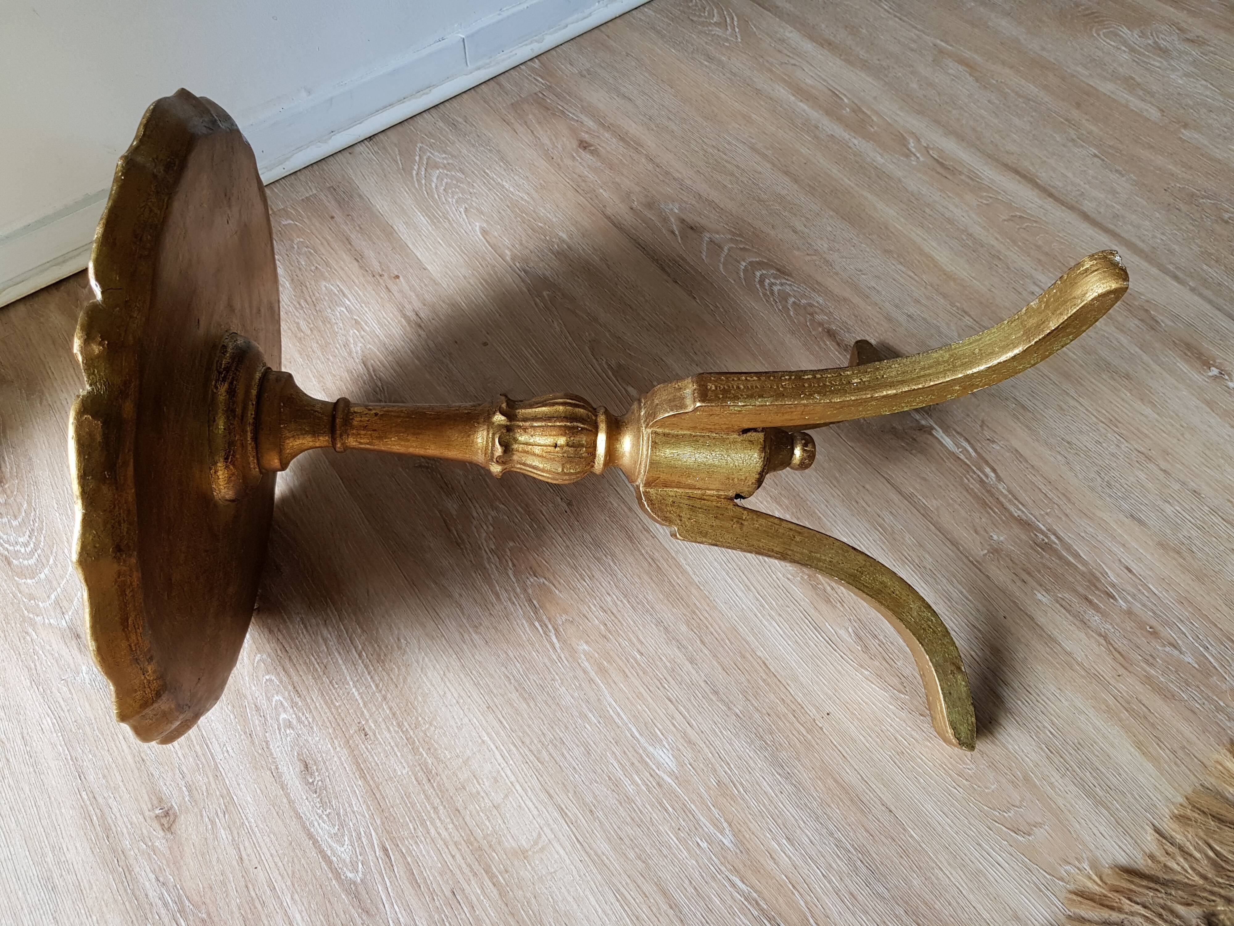 Golden wood tripod pedestal table