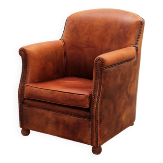 Vintage clubfauteuil van  schaapsleer met een prachtige patina,1970 Nederland