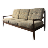 Vintage three-seater sofa — wood and sculptural backrest