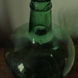 Dame Jeanne carboy from the Viresa collection in dark green glass