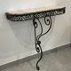 Wrought iron and marble console
