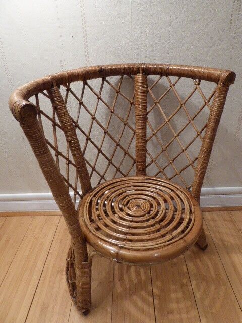 Vintage gold rattan armchair
