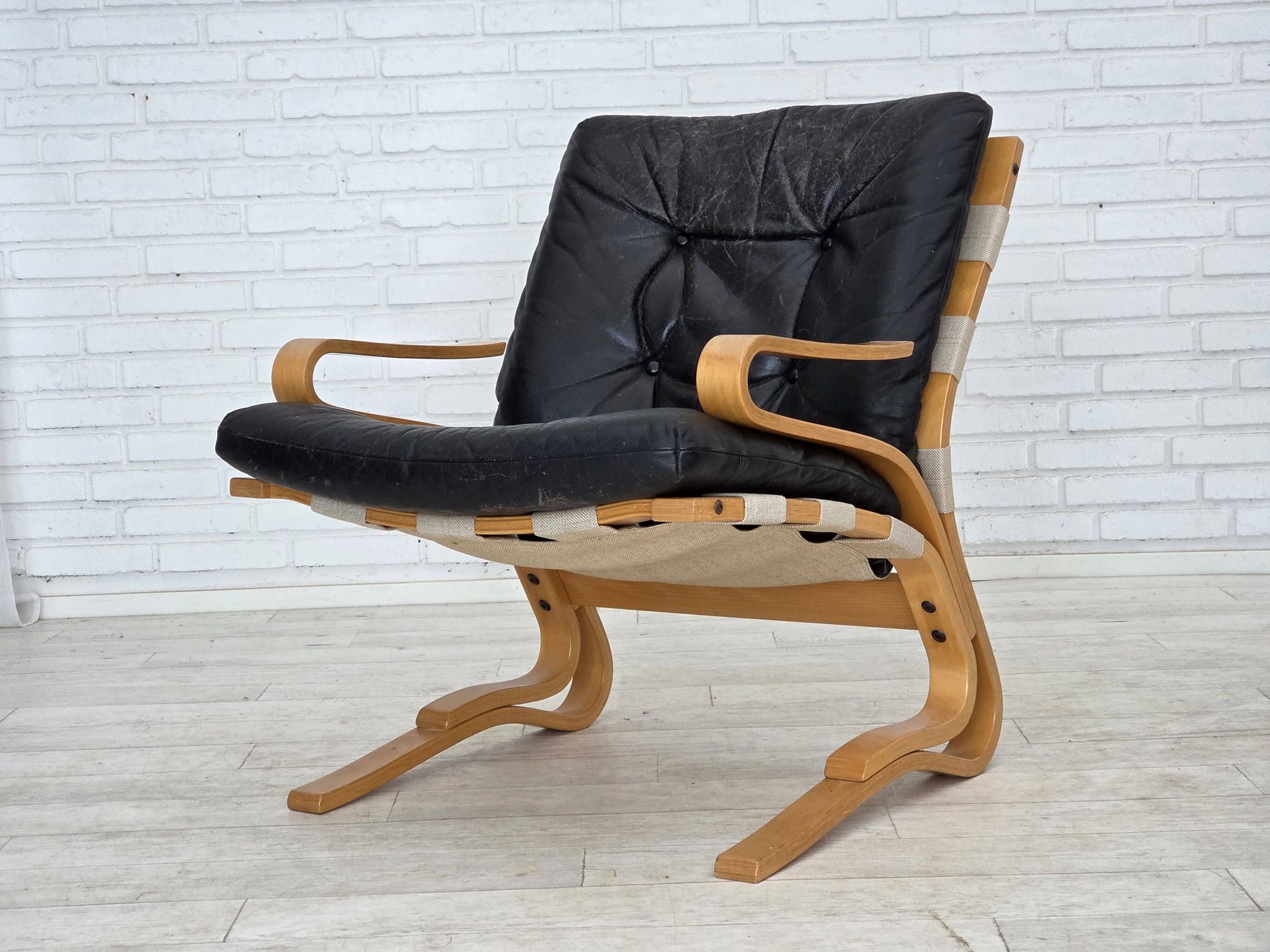 1970s, Norwegian design, armchair model "Kengu", leather, bent wood.