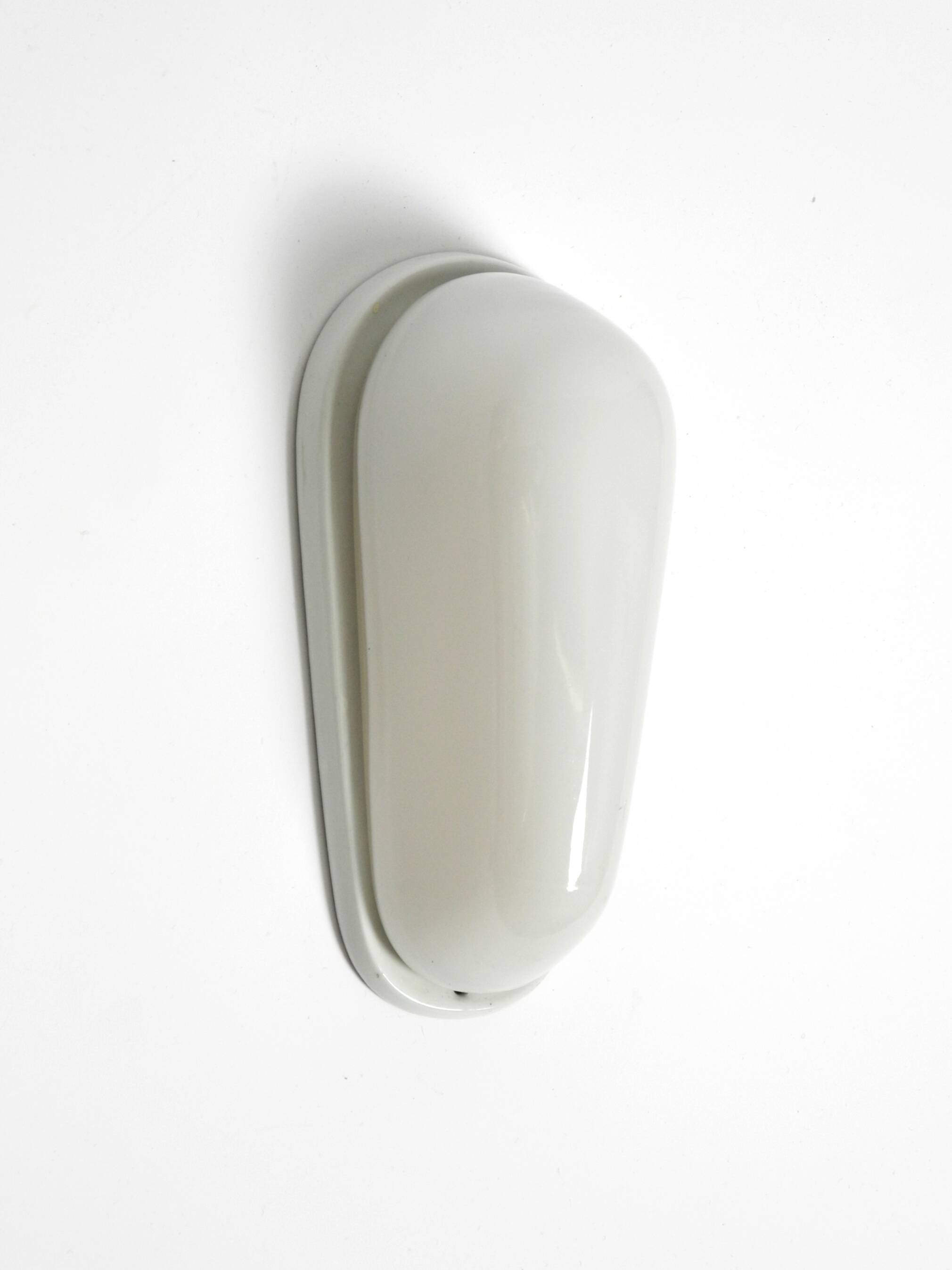 A Mid Century Modern Wagenfeld glass ceramic wall lamp