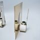 Pair of square metal and brass wall sconces