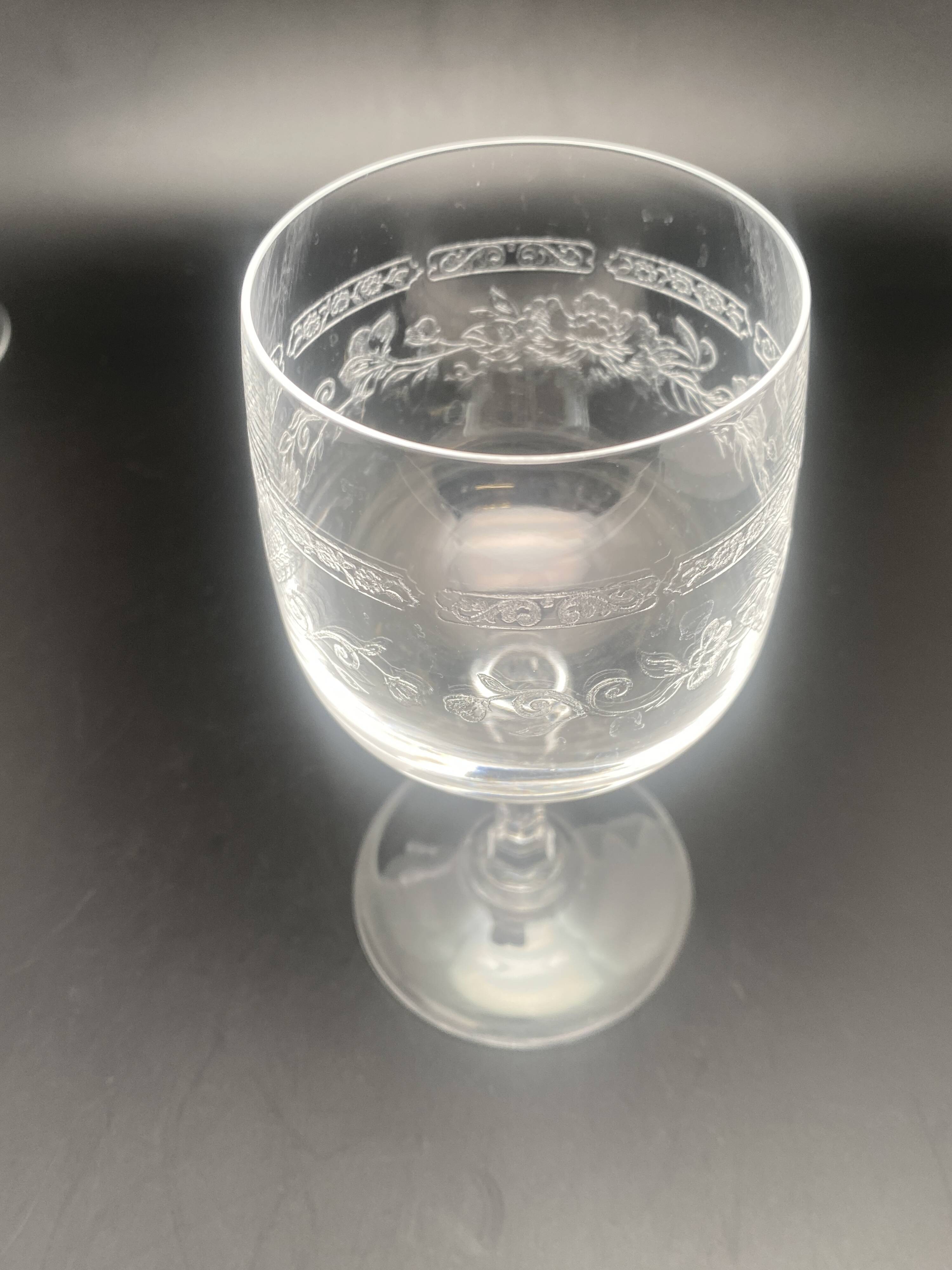 Chiseled crystal wine glasses with flower motif