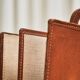Trompe-l'Oeil magazine rack 'Actentasche' in patinated leather and canvas
