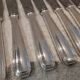 12 silver-plated table knives by Christofle America, 24.5cm