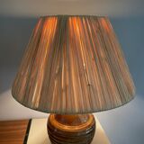 Sandstone lamp and raffia