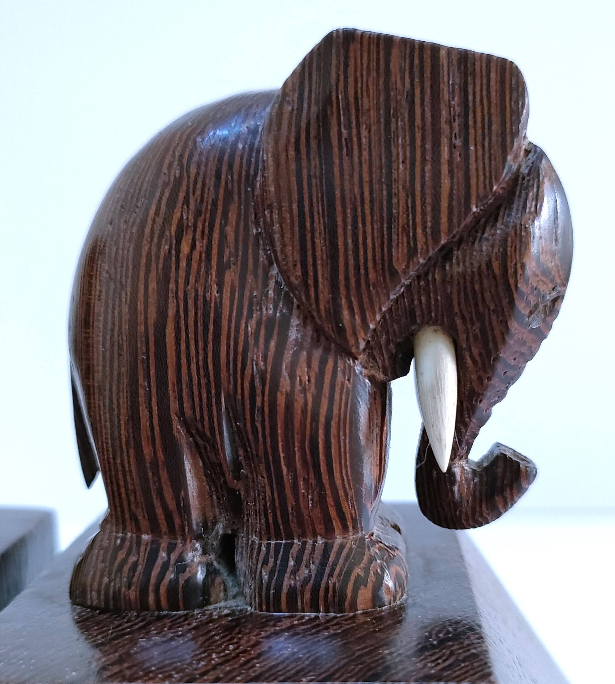 Pair of stylized elephant bookends in solid wood