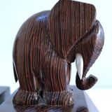 Pair of stylized elephant bookends in solid wood