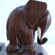 Pair of stylized elephant bookends in solid wood