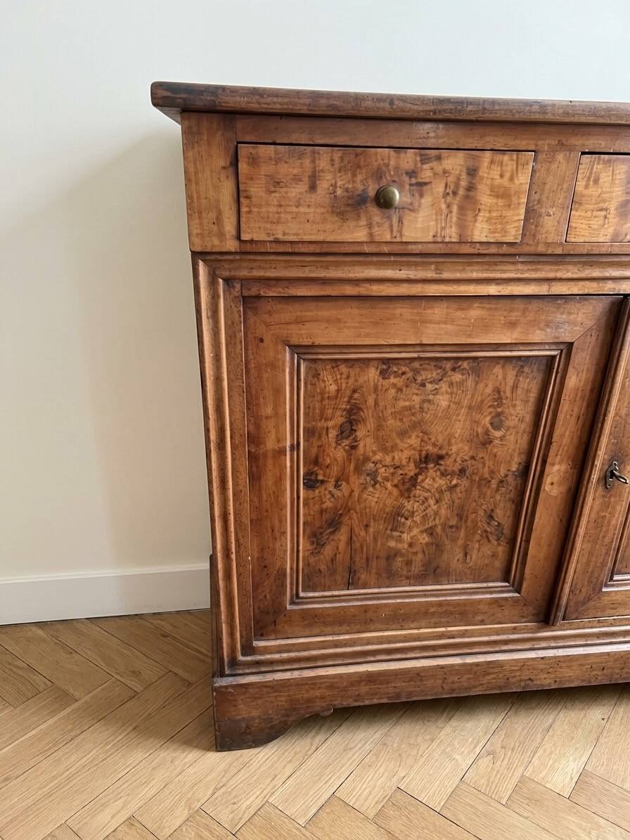 Antique walnut sideboard from the period.