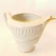 art deco porcelain milk jug with gold edging