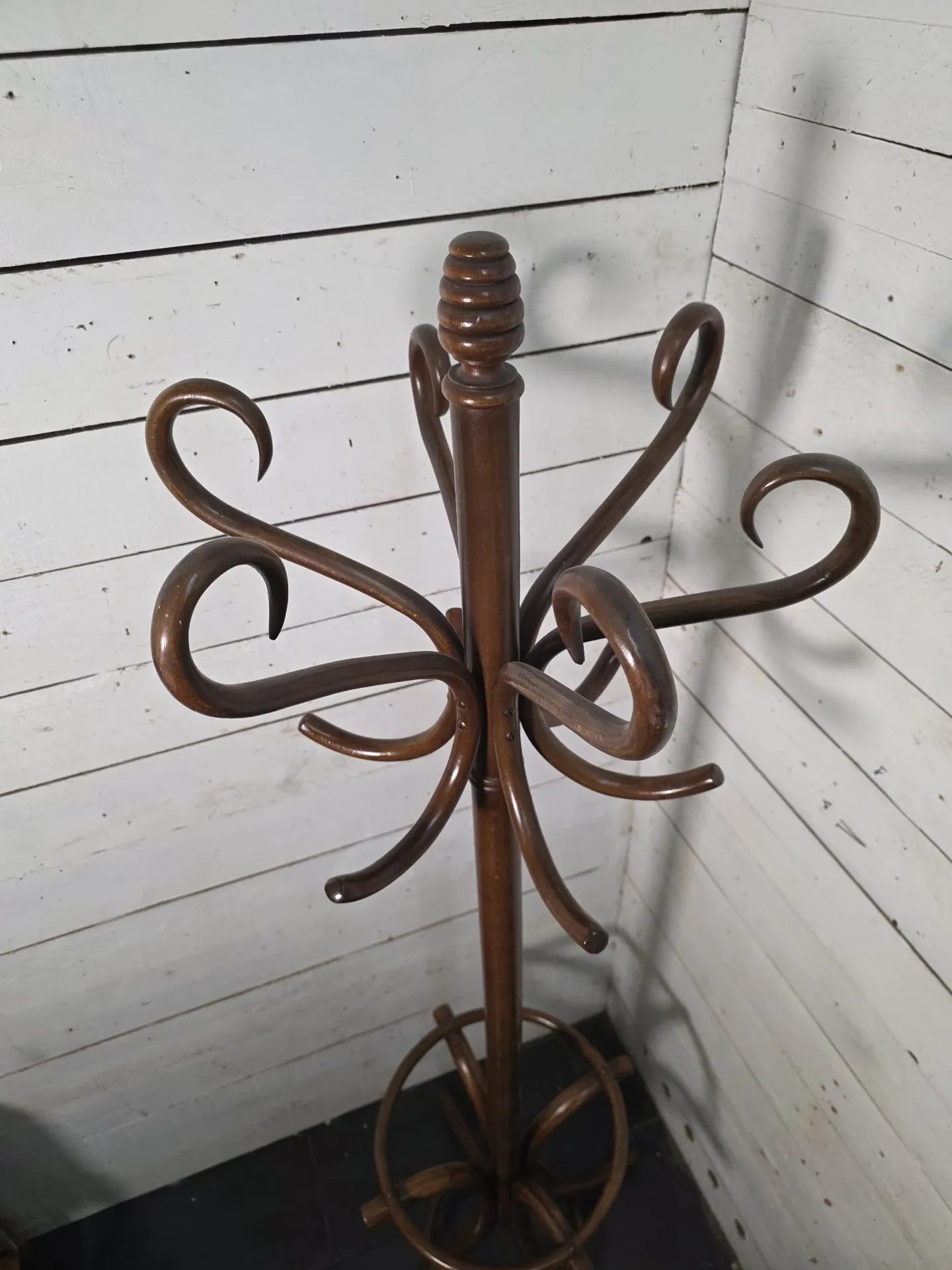 Curved antique wooden parrot