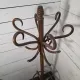 Curved antique wooden parrot