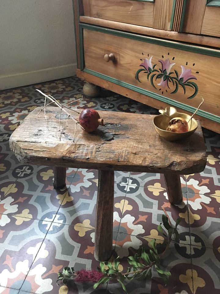 Crude wooden tripod stool