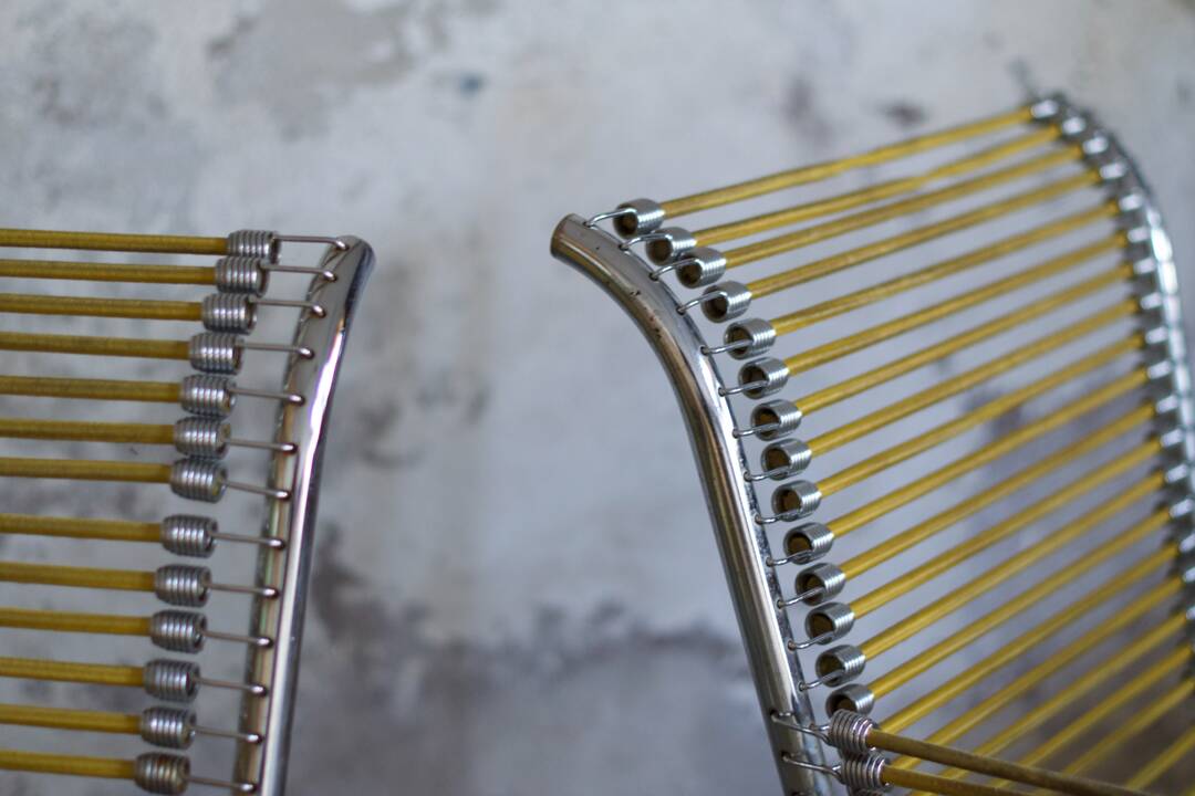 Two Rene Herbst Infabrica style Bungee armchairs