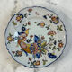 Flat plate in earthenware with polychrome decoration in Rouen style