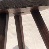 Tabouret tripode en bois ciselé
