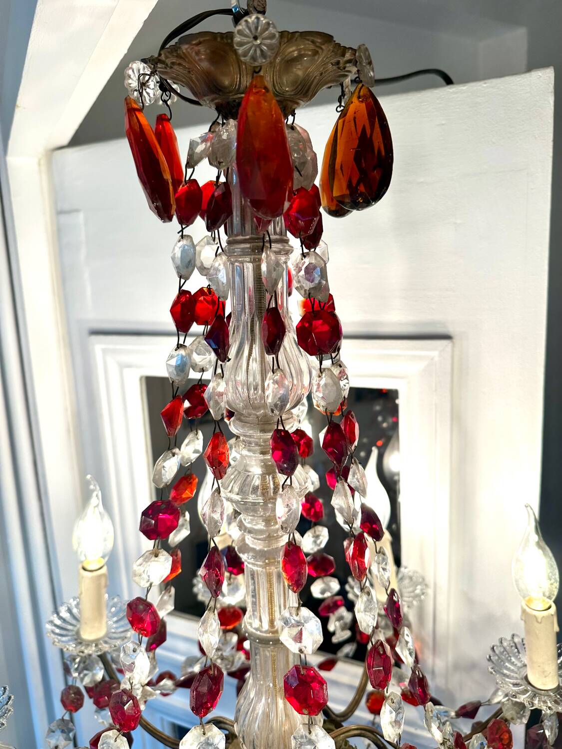 Antique chandelier with red crystal pendants, 9 lights.