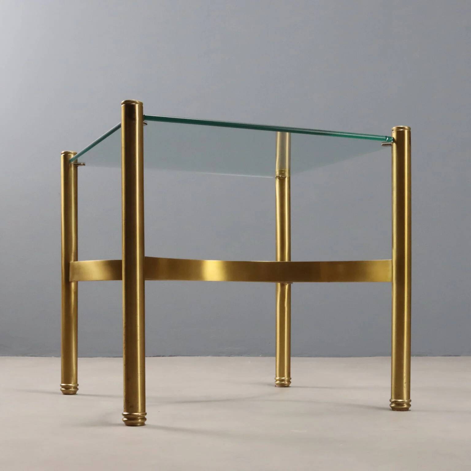 Vintage brass coffee table with glass top, Italian design from the 1970s.