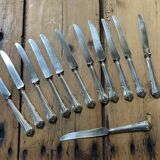 Set of 12 dessert knives in silver metal with steel blades from the early 20th century