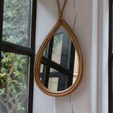 Vintage teardrop rattan mirror
