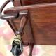 Anglo-Indian teak serving trolley with brass inlays from the 1930s-1940s.
