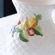Vintage woven fruit slip carafe