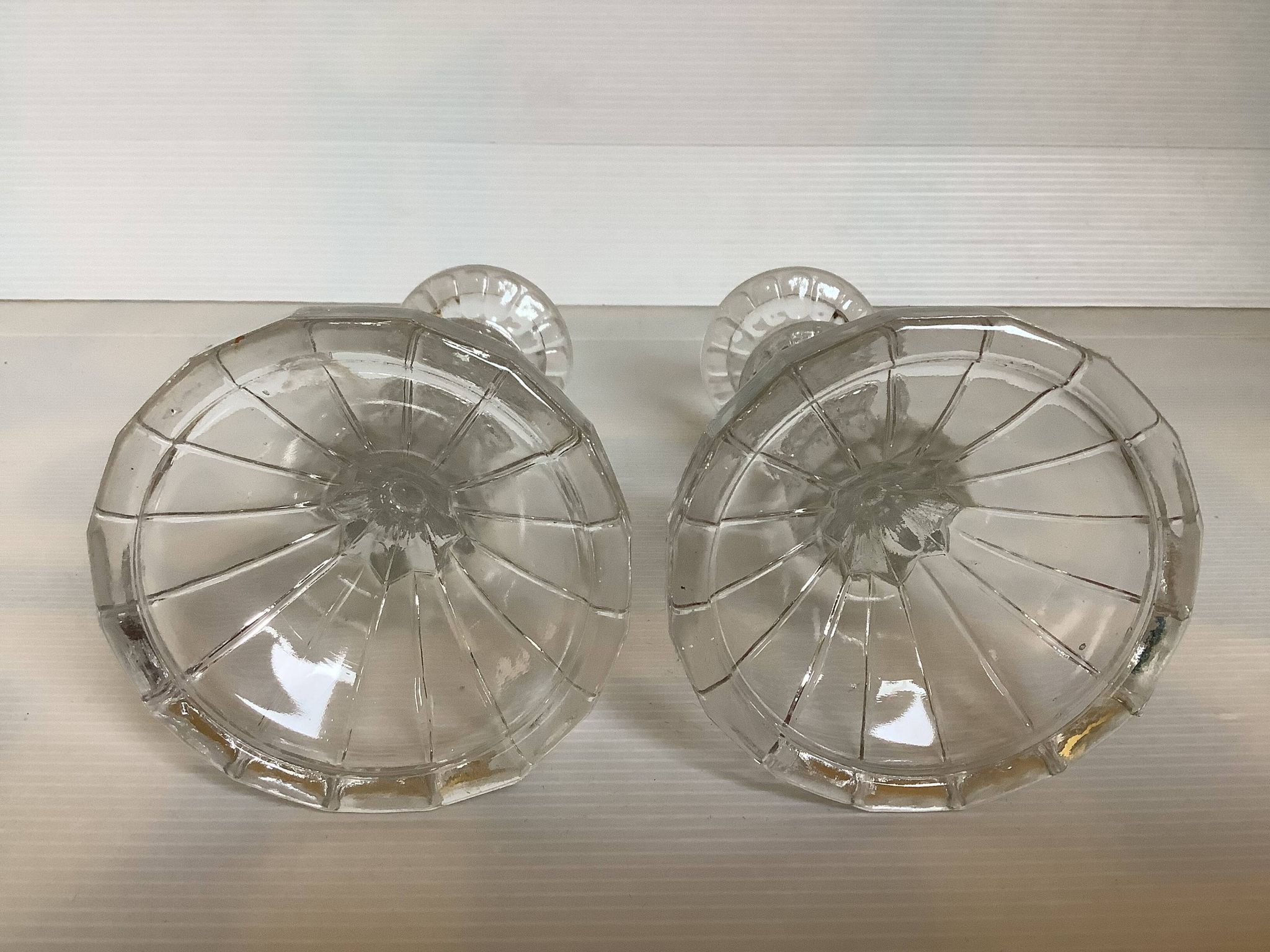 Pair of moulded glass candlesticks