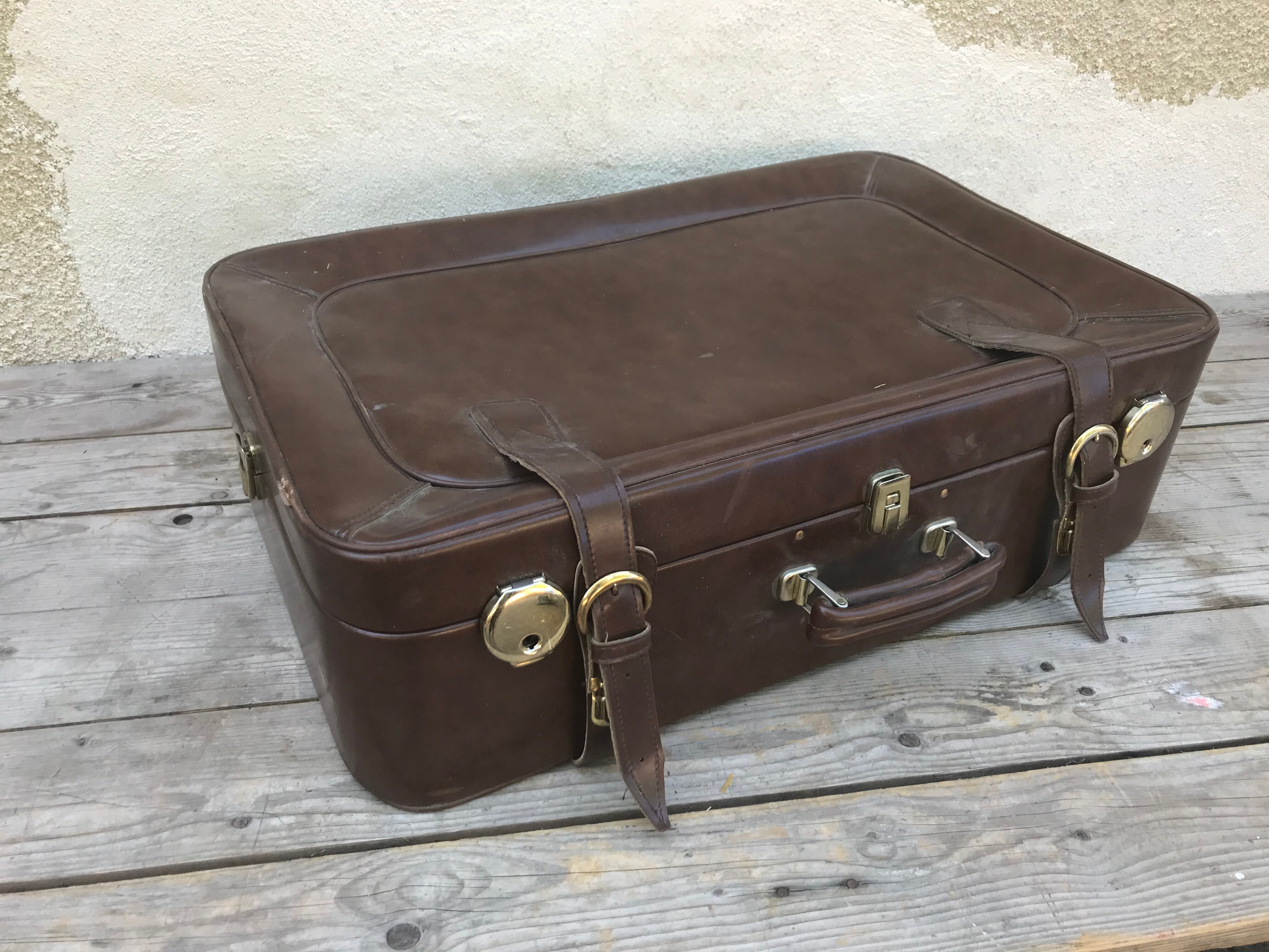 Old suitcase travel leather brown