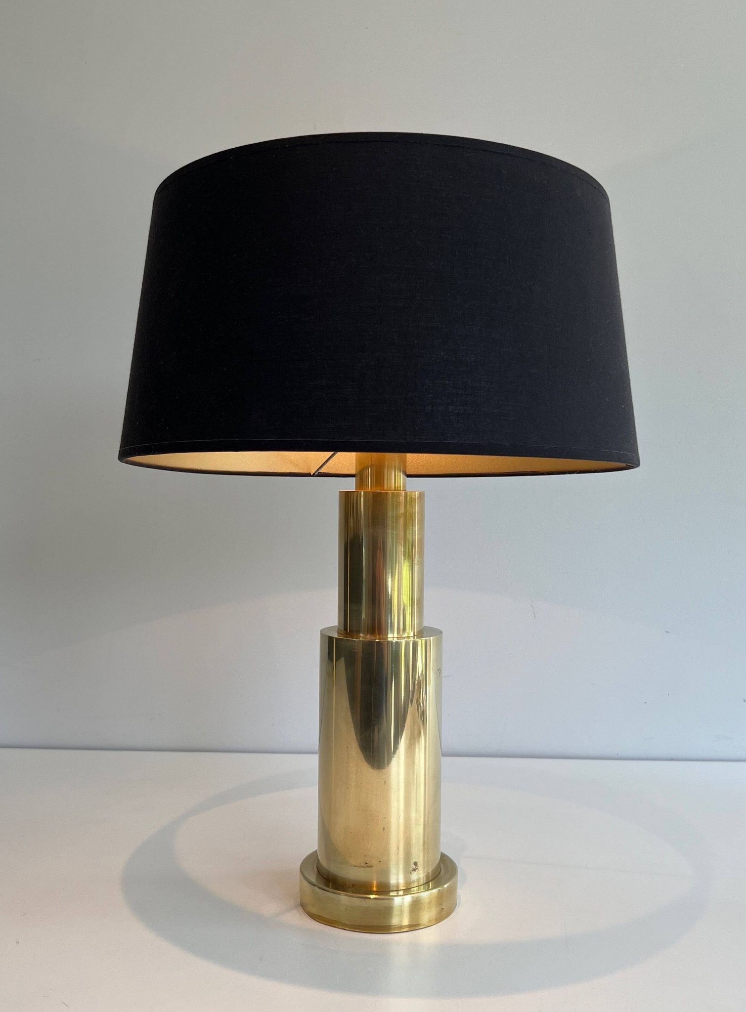 Pair of modernist brass lamps