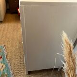 Restored wooden art deco chest of drawers with gilded handles