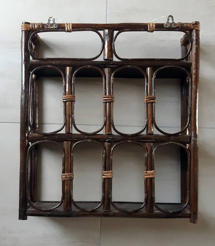 Rattan wall shelf from the 70s.