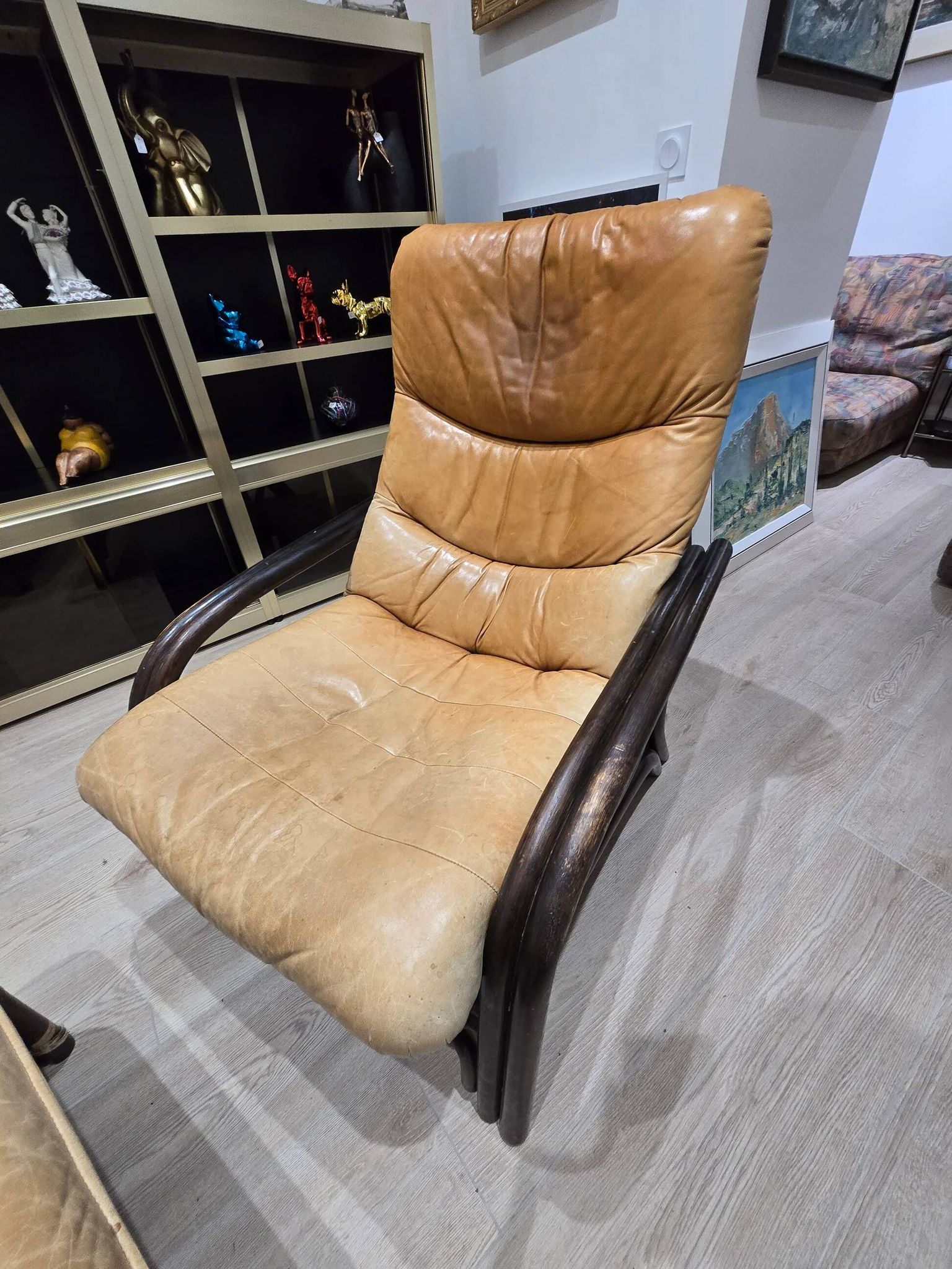 Vintage camel leather lounge chair with ottoman – wooden frame – 1970s