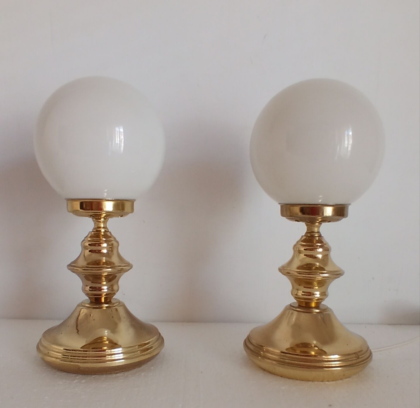 Pair of golden lamps